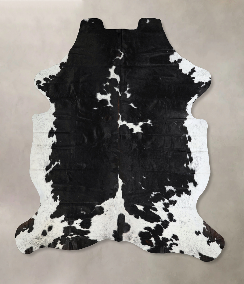 Luxurious Black and White Brazilian Cowhide Rug for Elegant Spaces