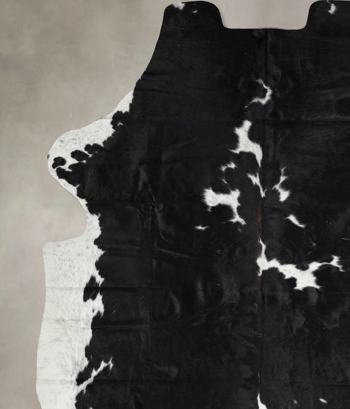 Luxurious Black and White Brazilian Cowhide Rug for Elegant Spaces